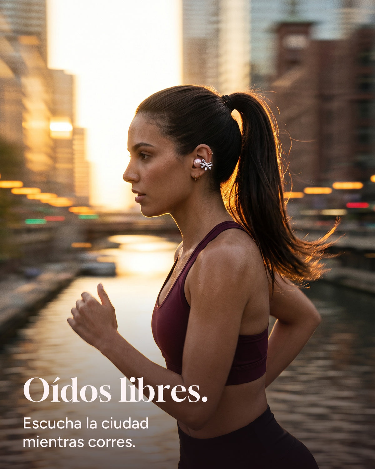 Woman running at sunset wearing Nacary open-ear earbuds