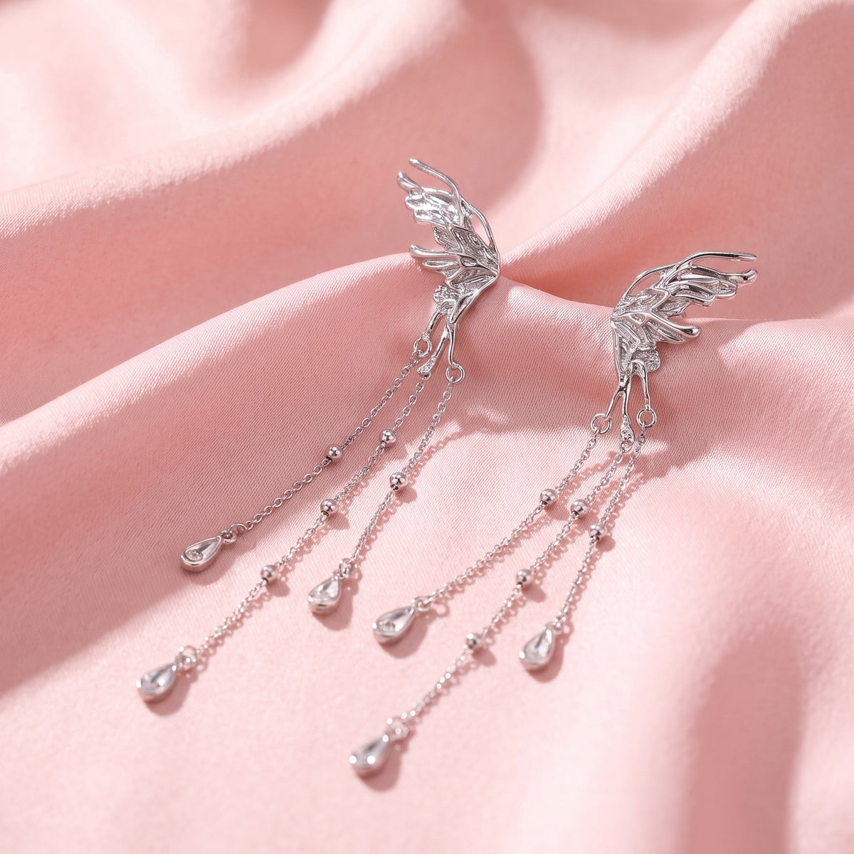 Cascade chain charm pair, close-up